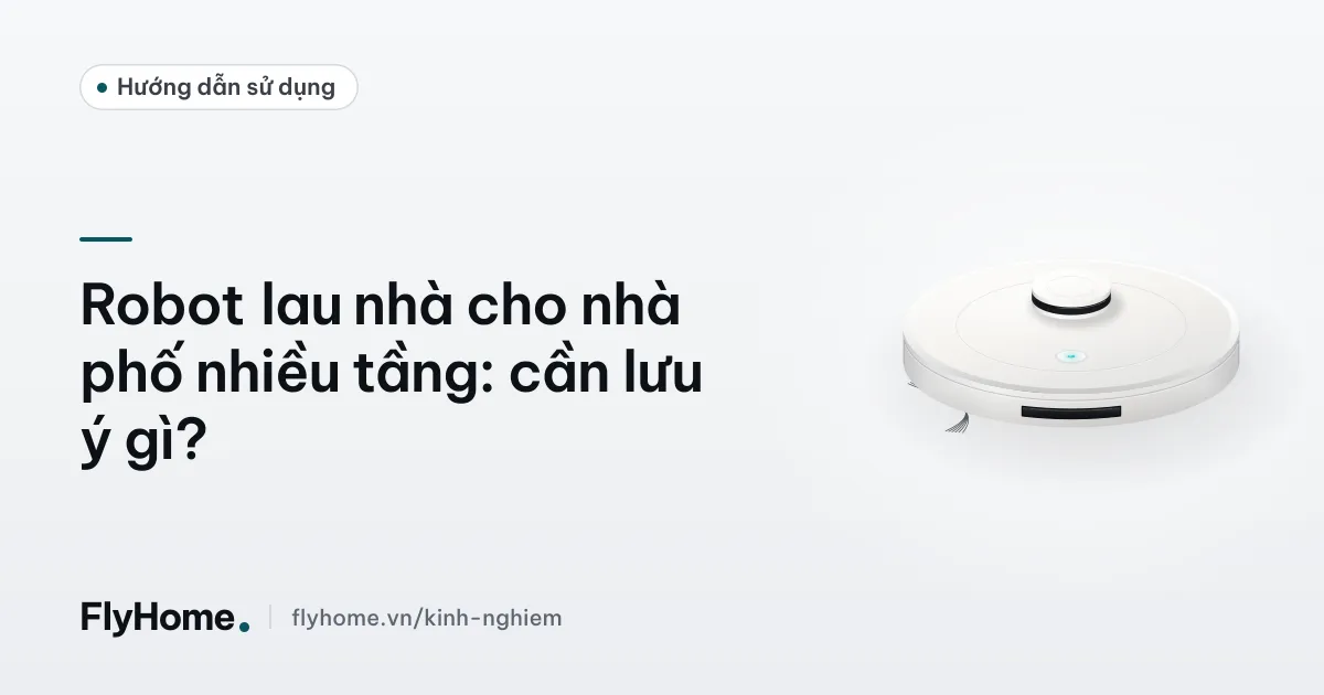 Robot lau nhà dừng lại trước mép cầu thang trong nhà phố nhiều tầng