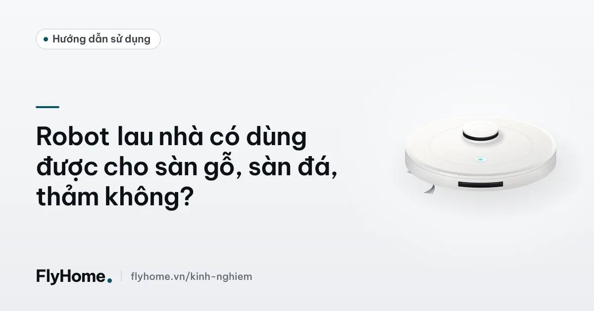 Robot lau nhà di chuyển từ sàn gỗ sang tấm thảm trong phòng khách